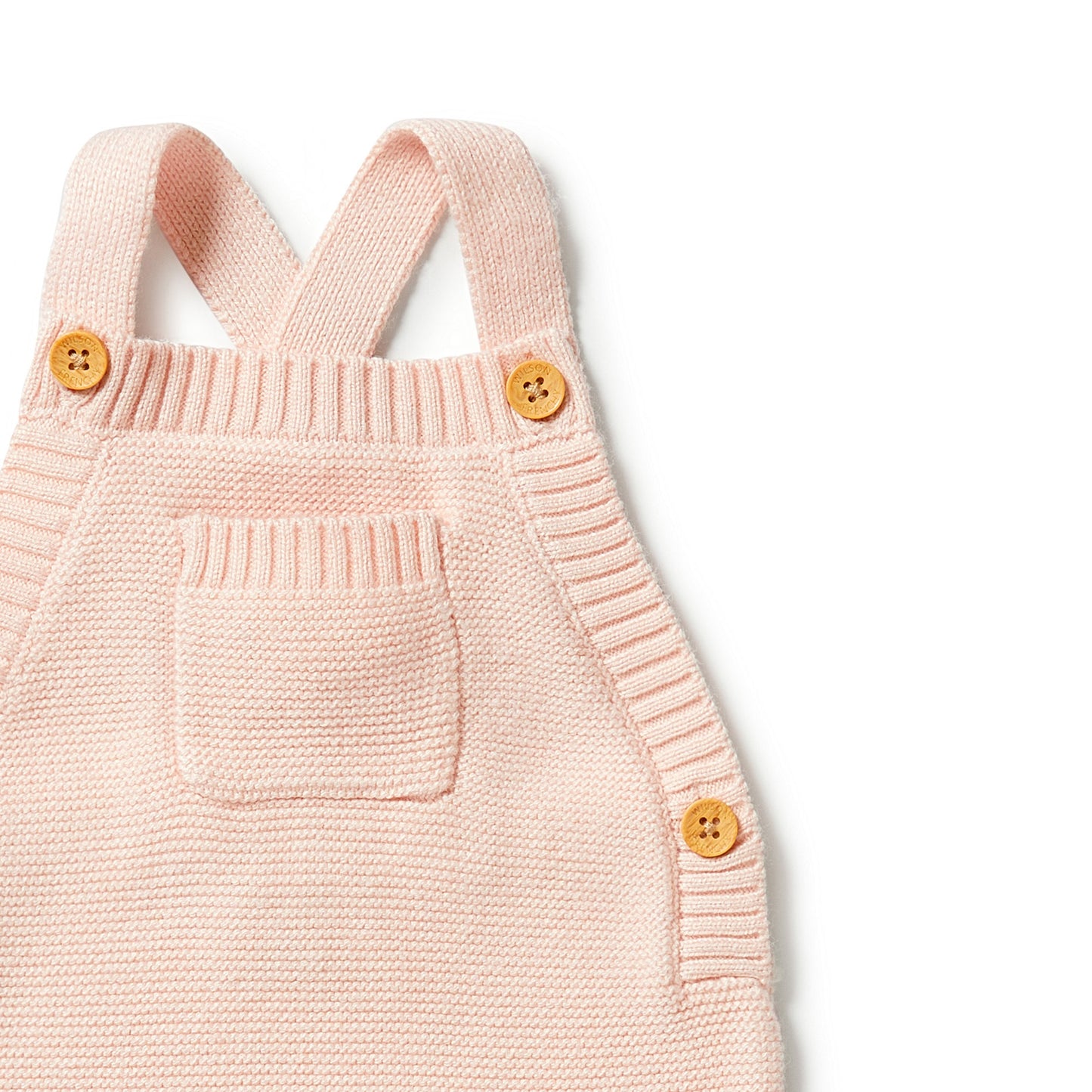 Pink knit overall front up close