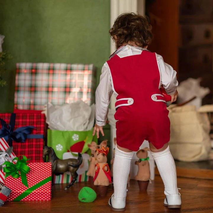 Red romper on toddler back view