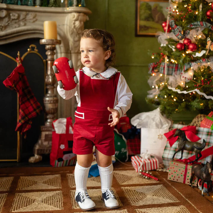 Red romper on toddler front view