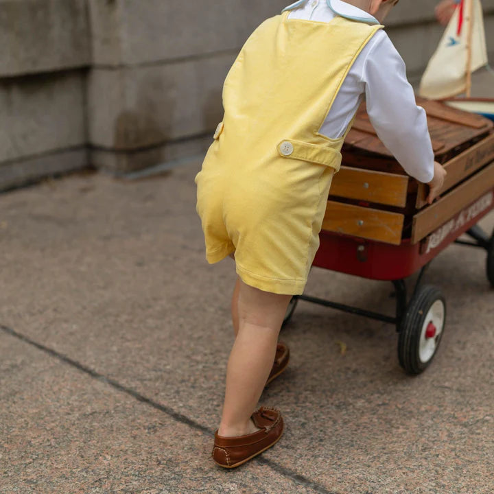 Yellow romper back view on toddler boy